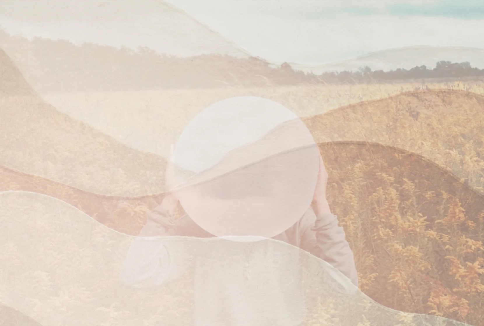 A layered portrait of a person facing a mountain landscape beneath translucent circular forms